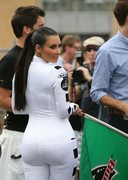 Kim Kardashian in a tight racing outfit