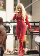 Nicki Minaj in a red body stocking