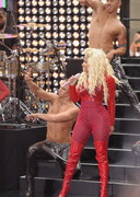 Nicki Minaj in a red body stocking