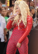 Nicki Minaj in a red body stocking