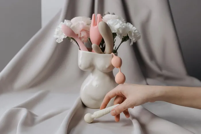 woman and her vase of vibrators