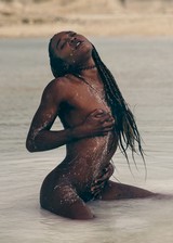 Black girl nude at the beach