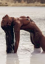 Black girl nude at the beach