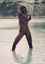 Black girl nude at the beach