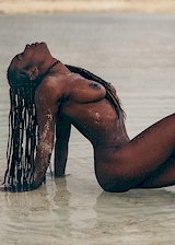 Black girl nude at the beach