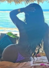 Elinda San does a hot beach photoshoot showing off her huge ass