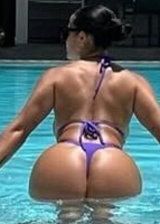 Katya Elise Henry shows off her MILFy booty at a pool