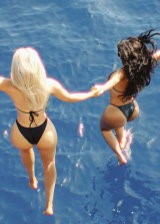 Kim Kardashian and Olivia Pierson go off swimming wearing bikinis and showing off their hot ass