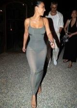 Kim Kardashian looks extra hot in a tight dress and hot butt