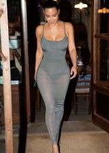 Kim Kardashian looks extra hot in a tight dress and hot butt