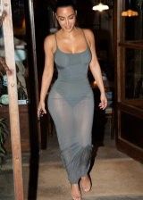 Kim Kardashian looks extra hot in a tight dress and hot butt