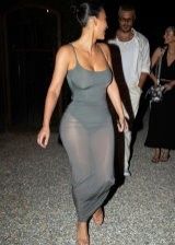 Kim Kardashian looks extra hot in a tight dress and hot butt