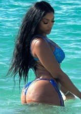 Porsha Williams shows off her sculpted ass while at the beach